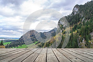 Empty wooden terrace with Austria national park view