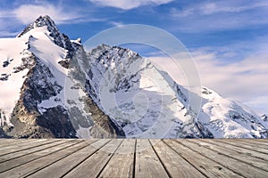 Empty wooden terrace with Mountain view of Franz Josefs Hohe Glacier