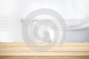 Empty wooden top table with blurred bathroom background