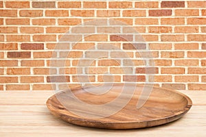 Empty wooden tray on perspective wooden table on top over blur b