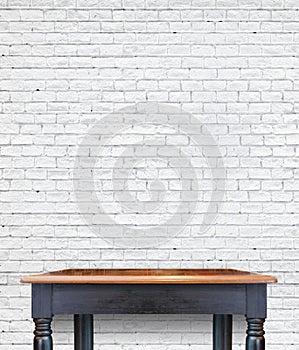 Empty wooden vintage table on brick tiles wall,Mock up for display of product