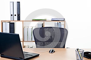Empty workplace desk in office concept business