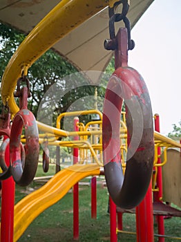 Empty worn and old monkey bars in the park. Healthy outdoor activity for kids. Sport for young children