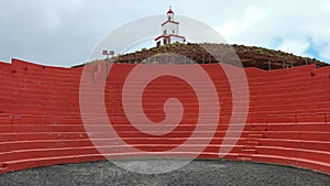 Empty wrestling arena with striking red seats used for the traditional fighting known as lucha Canarias, El Hierro, Canary Islands