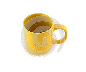 Empty yellow cup isolated top view