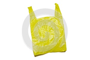 Empty yellow plastic bag isolated in clipping path.