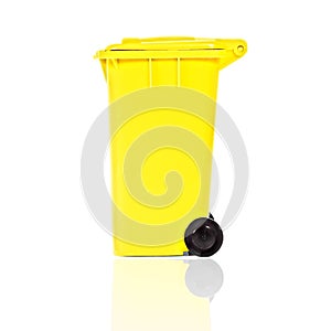 Empty yellow recycling bin