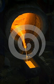 Emptying Crucible into Pig