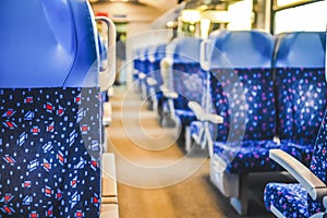 Emtpy interior of the train for long and short distance in Europe. A modern train seats or chairs.