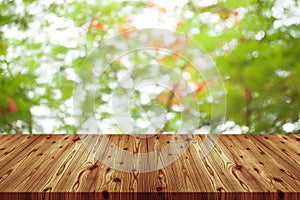 Emtry wooden table on top over blur natural background, can be used mock up for montage products display or design layout