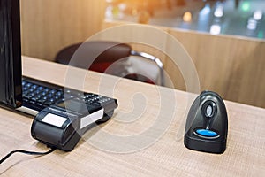 Emty cashier desk counter POS terminal with barcode scanner, receipt printer, wallet and credit card reader equipment