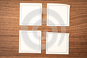 Emty Sticky notes, on a wooden background