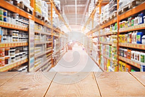 Emty wooden shelf product display. Hardware construction supermarket aisle and shelves. Perspective view of hypermarket