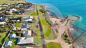 Emu Bay homes and coastline, Kangaroo Island from drone, Australia