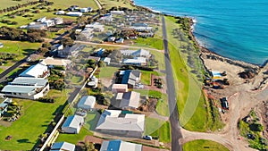 Emu Bay homes and coastline, Kangaroo Island from drone, Australia