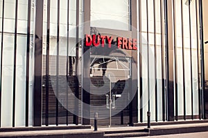 En entrance of duty free shop in the city