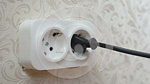 Enabling and disabling plug into the wall socket