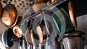 Enamel and brass kitchen utensils set