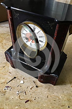 Enamel dial mantel clock broken waiting repair by clockmaker