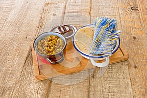 Enamel tart pan with Mexican flower cheese tacos with corn tortillas