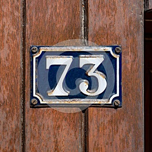 enameled house number 73