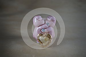 Enamored pink pigs on a light gray background