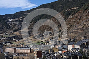 Encamp town in the Valira d`Orient river valley at the foot of Grandvalira resort in Andorra in Pyrenees mountains range in winter