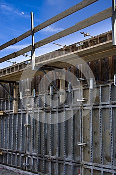 Encase new concreted bridgehead with steel reinforcement and for