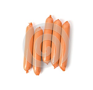 Encased sausages on white background, top view