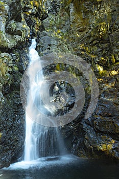 Enchanted waterfall out of the rocks