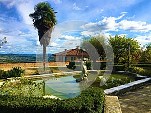 Enchanting Govone castle`s garden, Piedmont region, Italy. Art, architecture, fountain, history and urban design