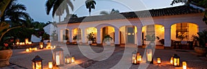 Enchanting lantern lit courtyard oasis with greenery, flowers, and traditional charm.