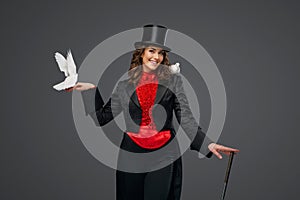 Enchanting magician with white doves