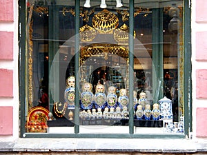 Enchanting Matriochkas: Captivating Russian Nesting Dolls Adorning a Boutique Window in Moscow