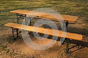 enches and wooden garden table