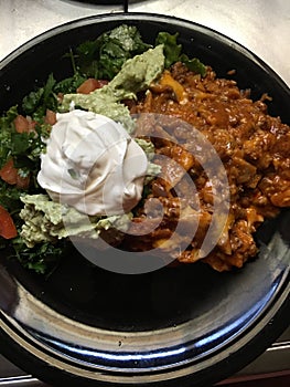 Enchilada casserole with side of guac photo