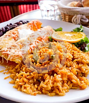 Enchilada with tomato rice photo
