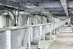 Enclosed conveyor with hoppers in a Food processing plant photo