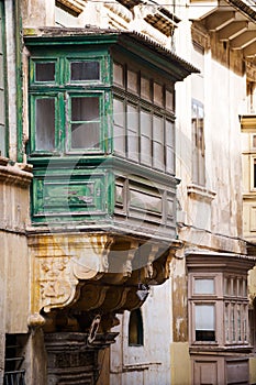 Enclosed wooden balconies in Malta