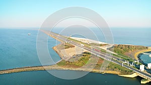 Enclosure Dam (Afsluitdijk): Trucks and Cars Driving on the Long Dam - Friesland, The Netherlands – 4K Drone