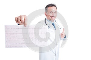 Encouraging cardiologist showing healthy ekg and like gesture