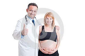 Encouraging medic or doctor showing like with beautiful pregnant