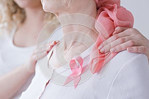 Encouraging mother with breast cancer