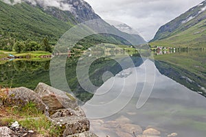 End of fjord. Beautiful Norwegian landscape. view of the fjords. Norway ideal fjord reflection in clear water selective focus