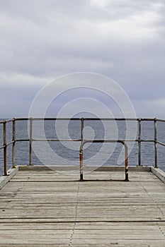 End of Port Noarlunga Jetty with ocean background.