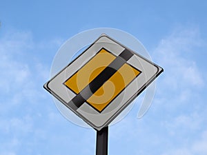 End of priority road sign