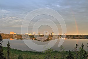 Yellowknife Skyline with Territorial Assembly Building and Rainbow behind Frame Lake, Northwest Territories, Canada photo