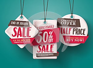 End of season Christmas sale vector set of red sale tags hanging with half price text