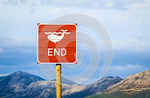 End of whales road sign