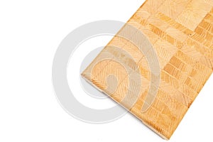 Endgrain wooden cutting board isolated above white background